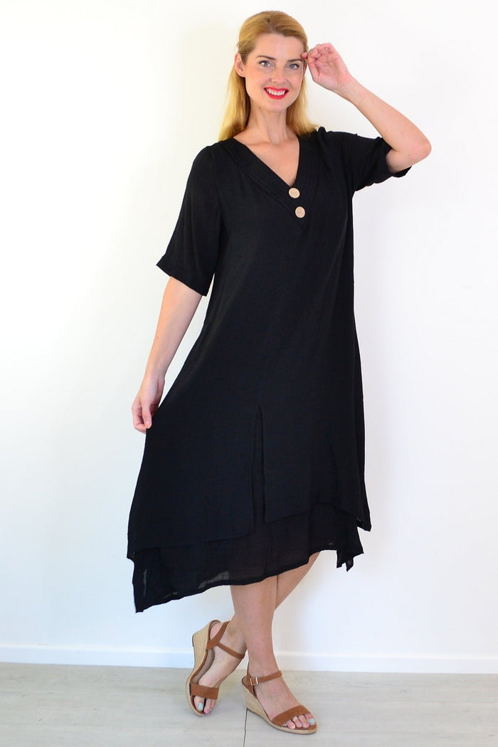 Black summer tunic dress by La Mode, featuring a relaxed fit with short sleeves and a flowing silhouette, perfect for warm weather.