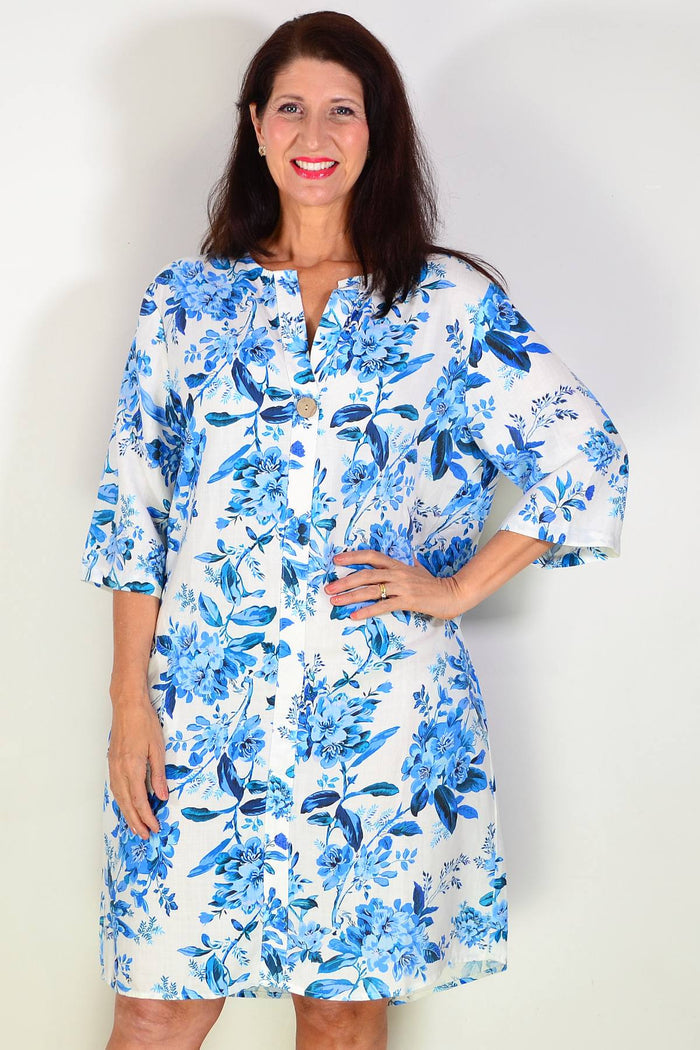 Blue floral linen blend tunic by La Mode, featuring a relaxed fit with floral print and lightweight fabric for casual wear.