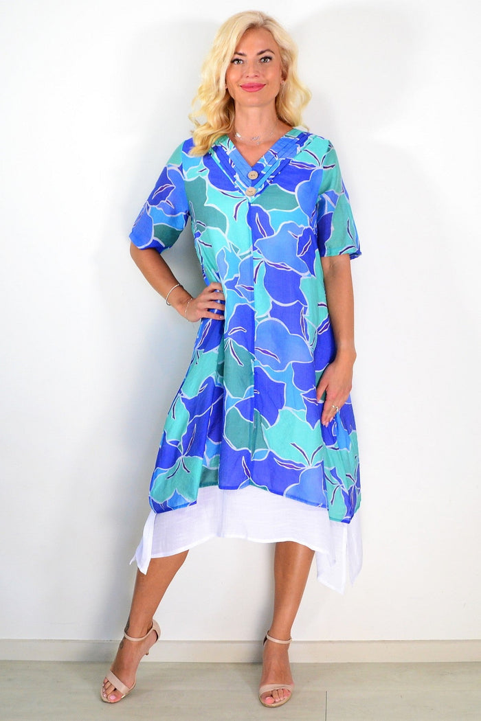 Blue and green summer tunic dress by La Mode, lightweight fabric with relaxed fit and floral pattern, perfect for warm weather.