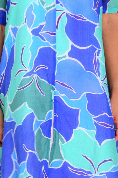 Blue and green summer tunic dress by La Mode, featuring lightweight fabric and casual fit, displayed on a hanger.