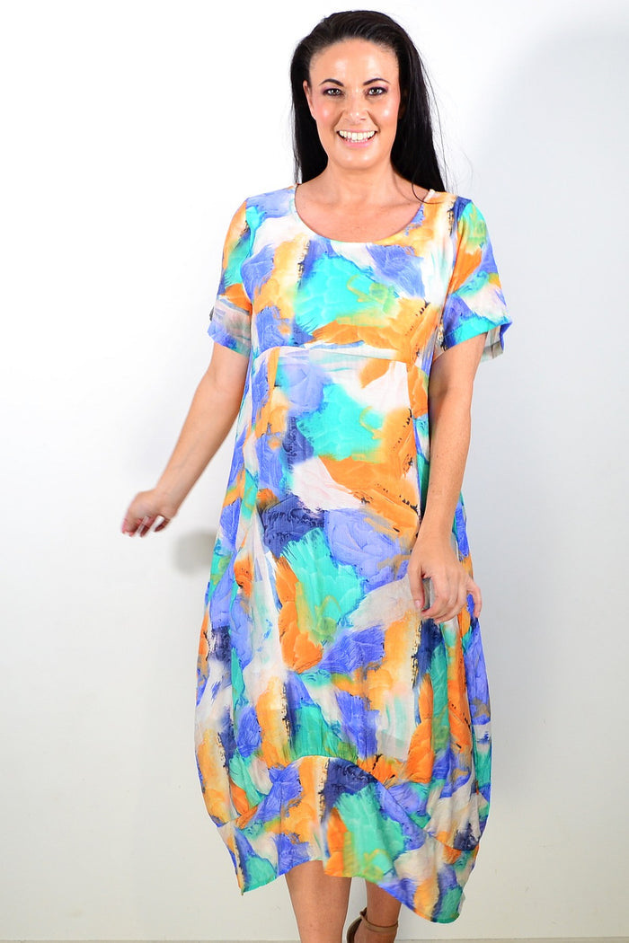 Blue Orange Aqua short sleeves Cali&Co tunic dress with a relaxed fit, displayed on a hanger against a white background.