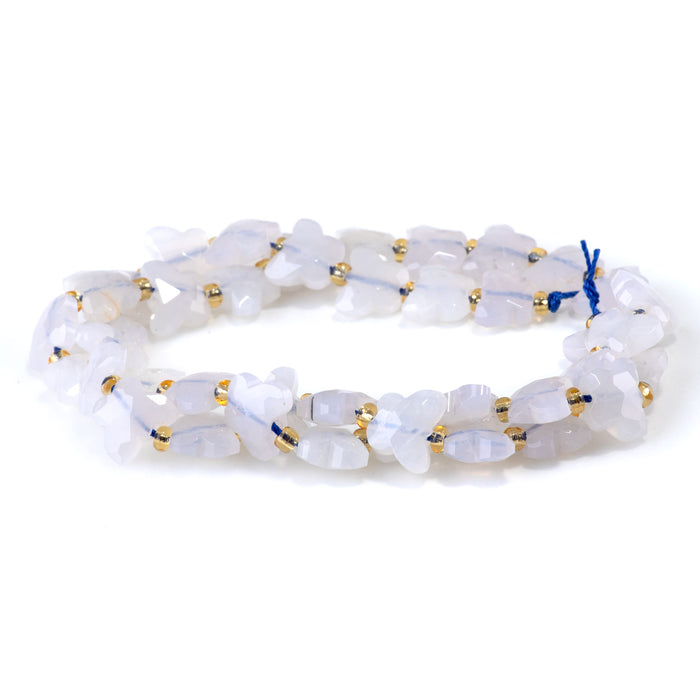 This is a Dakota Stones 10x8mm Blue Rose Quartz Butterfly Gemstone strand with faceted beads in 15-16 inch strand.