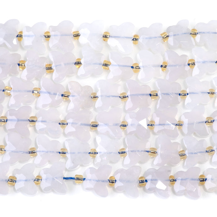 This is a Dakota Stones 10x8mm Blue Rose Quartz Butterfly Gemstone strand with faceted beads in 15-16 inch strand.