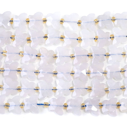 This is a Dakota Stones 10x8mm Blue Rose Quartz Butterfly Gemstone strand with faceted beads in 15-16 inch strand.