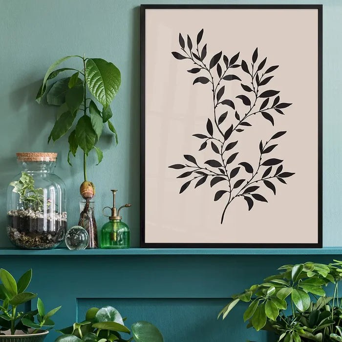 Branch Silhouette Print 1 black framed on a living room shelf