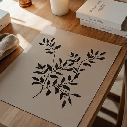 Branch Silhouette Print 2, vintage botanical print unframed on a home office desk