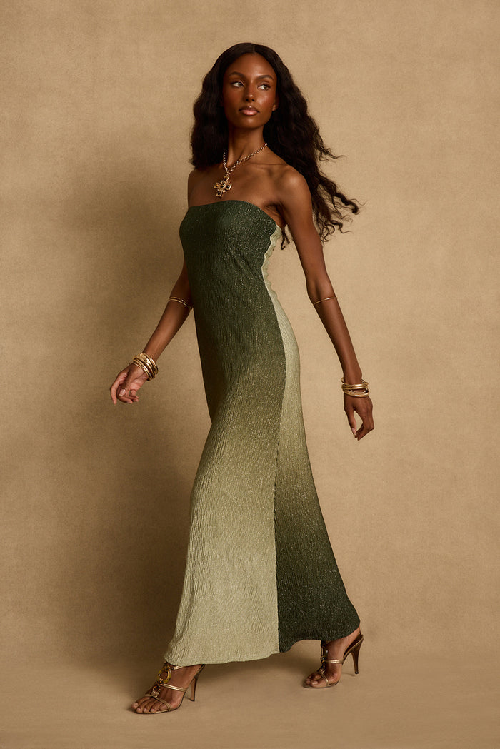Sage ombre strapless maxi dress with shimmer texture, styled with gold sandals and bangles.