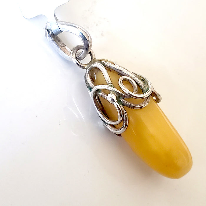 Butterscotch  amber pendant drop in siver