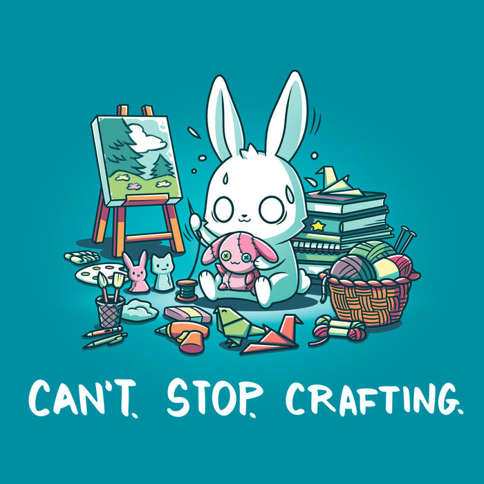 Classic Cotton T-shirt_TeeTurtle Can't. Stop. Crafting. tropical blue t-shirt featuring an illustration of a white rabbit with large, expressive eyes, and sweat droplets coming from its head sewing a small pink bunny surrounded by crafting materials like balls of yarn in a woven basket, paint pallets and brushes,  origami birds and other shapes, sewing thread, small stuffed animals, books stacked high, craft knives, and other crafting supplies, with the text "CAN'T. STOP. CRAFTING." at the botto