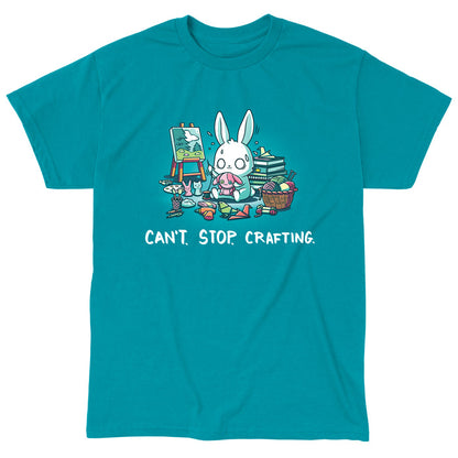 Classic Cotton T-shirt_TeeTurtle Can't. Stop. Crafting. tropical blue t-shirt featuring an illustration of a white rabbit with large, expressive eyes, and sweat droplets coming from its head sewing a small pink bunny surrounded by crafting materials like balls of yarn in a woven basket, paint pallets and brushes,  origami birds and other shapes, sewing thread, small stuffed animals, books stacked high, craft knives, and other crafting supplies, with the text "CAN'T. STOP. CRAFTING." at the botto