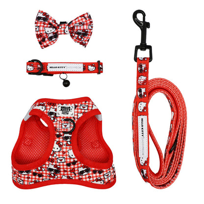 The Cat Bundle - Hello Kitty® Red Classic by Sassy Woof is a red and white plaid set featuring a collar with bell, bowtie, harness, and leash—all with Hello Kitty designs and black hardware.