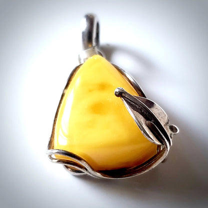 Classic small butterscotch amber pendant in sterling silver frame