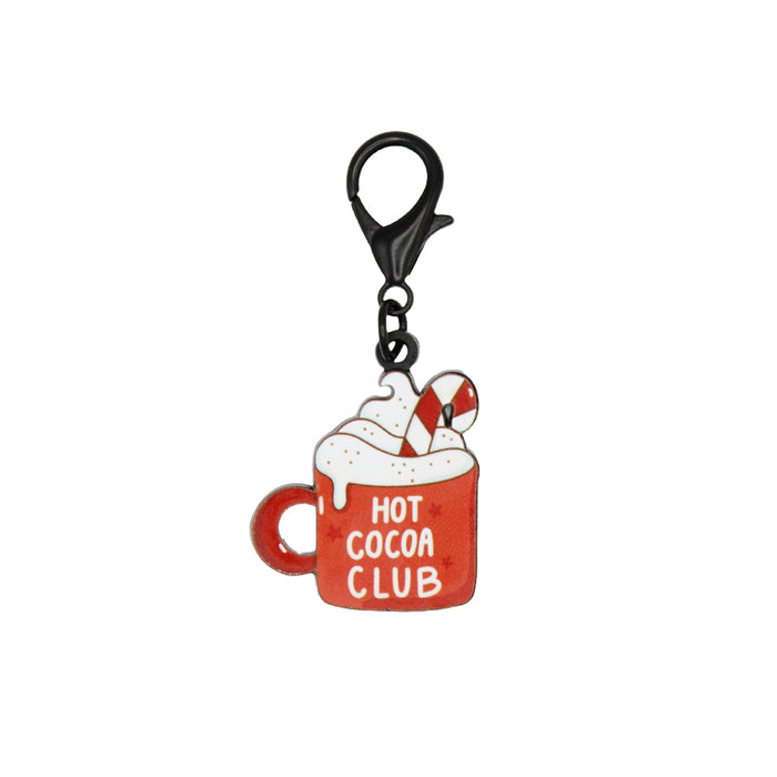 Add holiday cheer with the Sassy Woof Collar Tag - Hot Cocoa Club, shaped like a red mug with whipped cream and a candy cane. The tag reads HOT COCOA CLUB—perfect for matching your pet's festive accessories!.