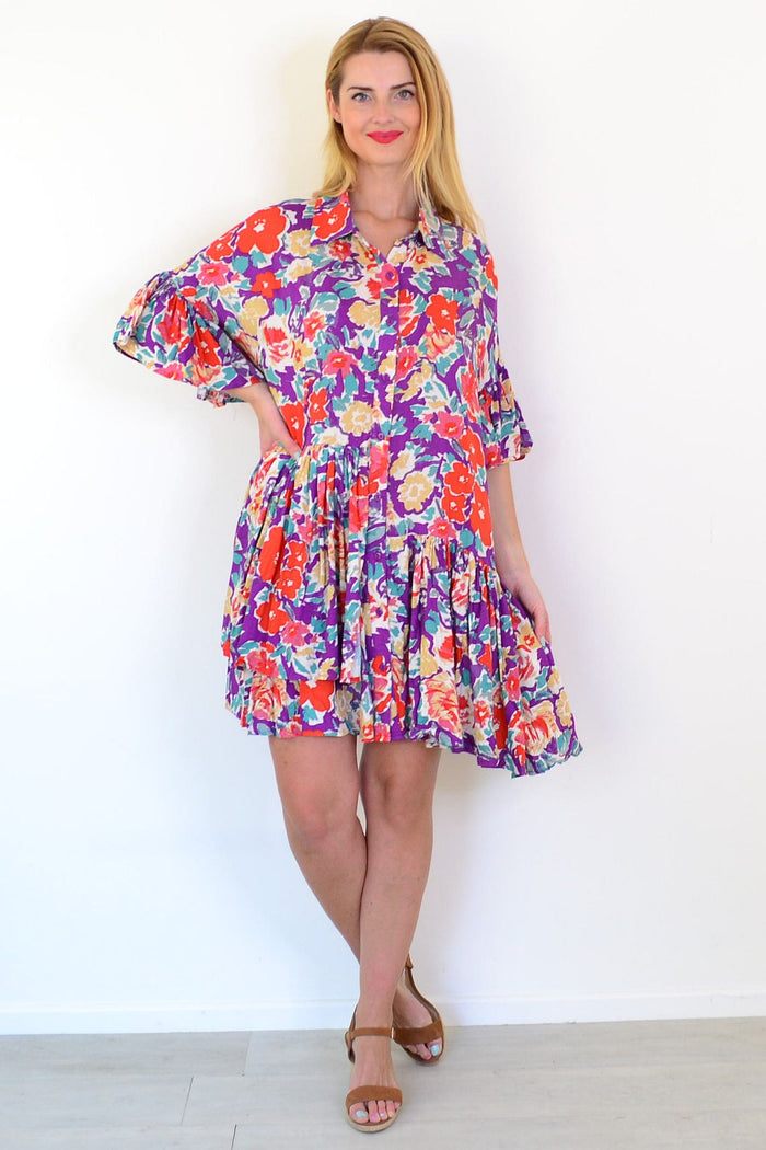 Colorful bohemian tunic dress by Dream with vibrant patterns, flowing fabric, and a relaxed fit, perfect for casual wear.