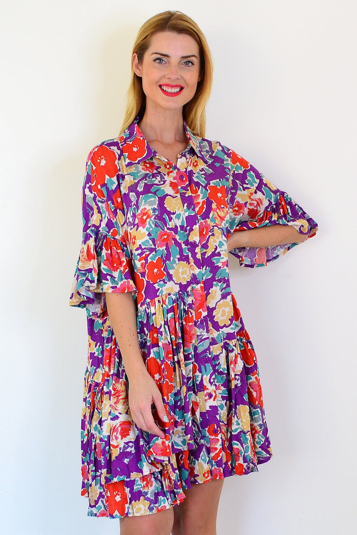 Colorful Bohemian shirt dress by Dream, featuring vibrant patterns, relaxed fit, and lightweight fabric, perfect for casual wear.
