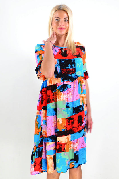 Colorful print patches tunic dress by Hourglass, featuring vibrant patchwork design and comfortable fit, perfect for casual wear.