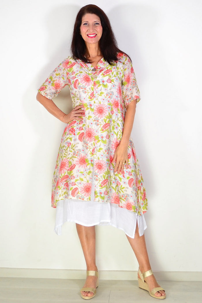 Cream flower print summer tunic dress by La Mode, lightweight fabric with floral design, displayed on a hanger.