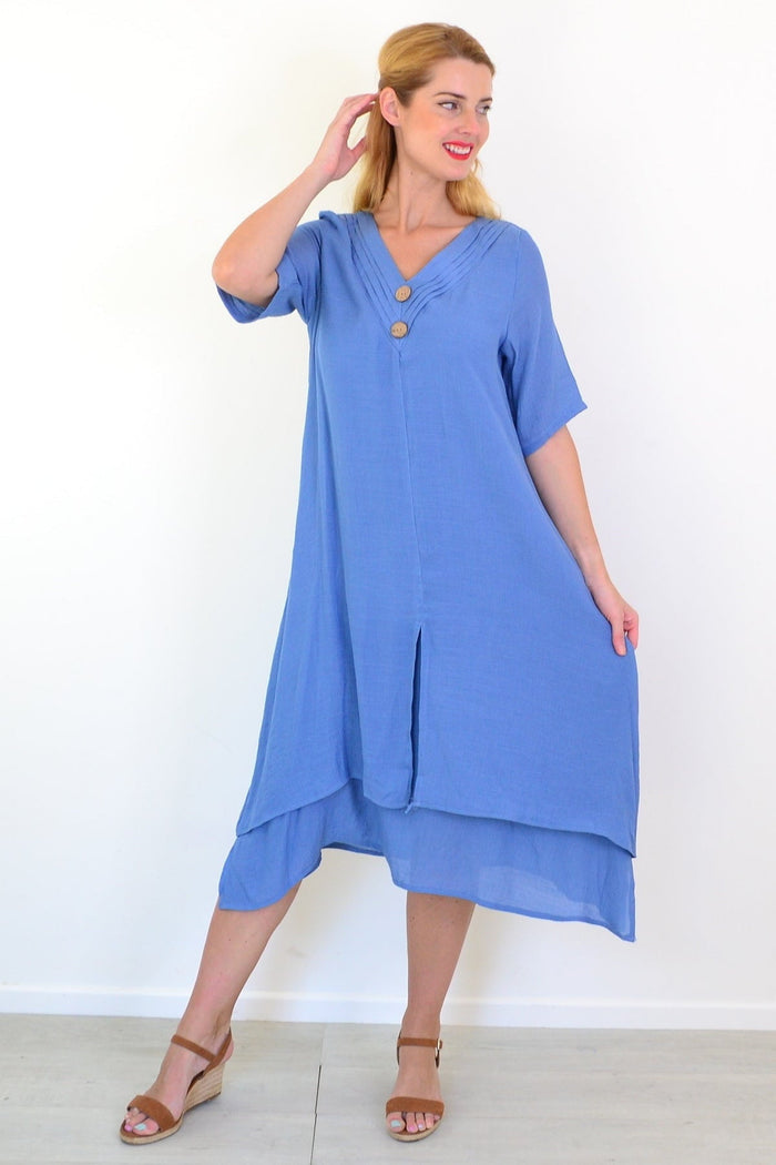 Denim blue summer tunic dress by La Mode, featuring a relaxed fit with short sleeves and casual style, displayed on a hanger.