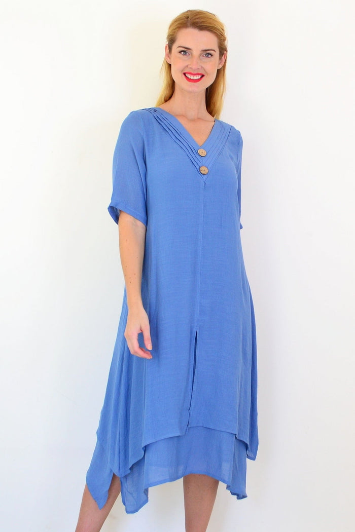 Blue denim summer tunic dress by La Mode, featuring a casual sleeveless design and relaxed fit, shown on a model.