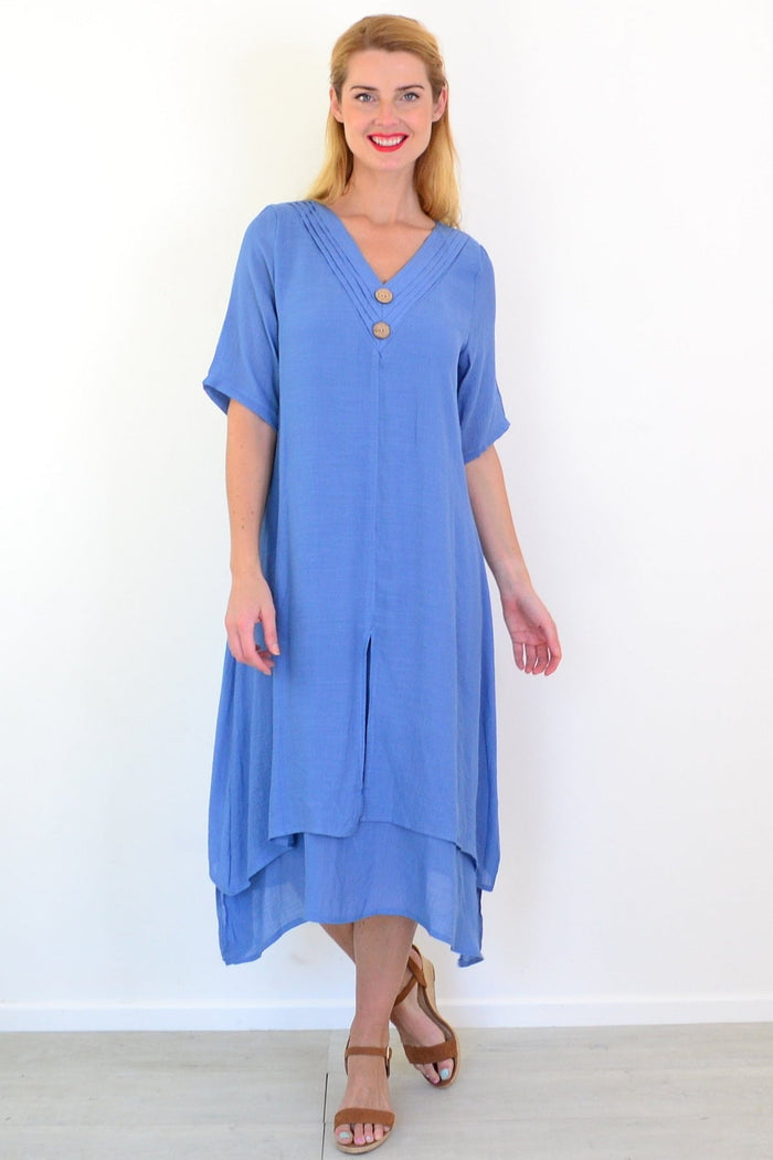 Denim blue summer tunic dress by La Mode, sleeveless with a relaxed fit and casual style, displayed on a hanger.