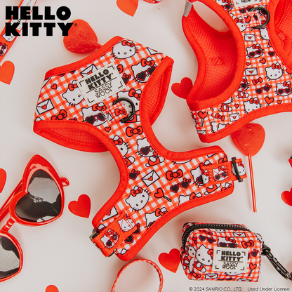 The Sassy Woof Dog Adjustable Harness - Hello Kitty® Red Classic combines iconic style and comfort, perfect for making your pet's outdoor adventures both fashionable and secure.