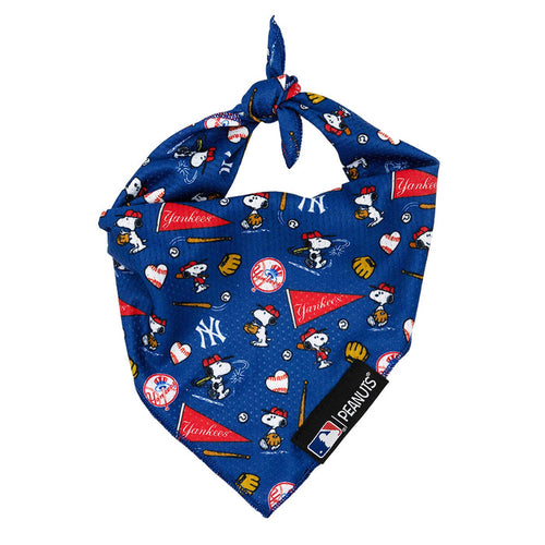The Sassy Woof Dog Bandana - MLB™ x Peanuts™ New York Yankees™ features Peanuts characters, gloves, bats, and red pennants with a knot and black MLB | Peanuts tag—part of the playful MLB Peanuts collection.