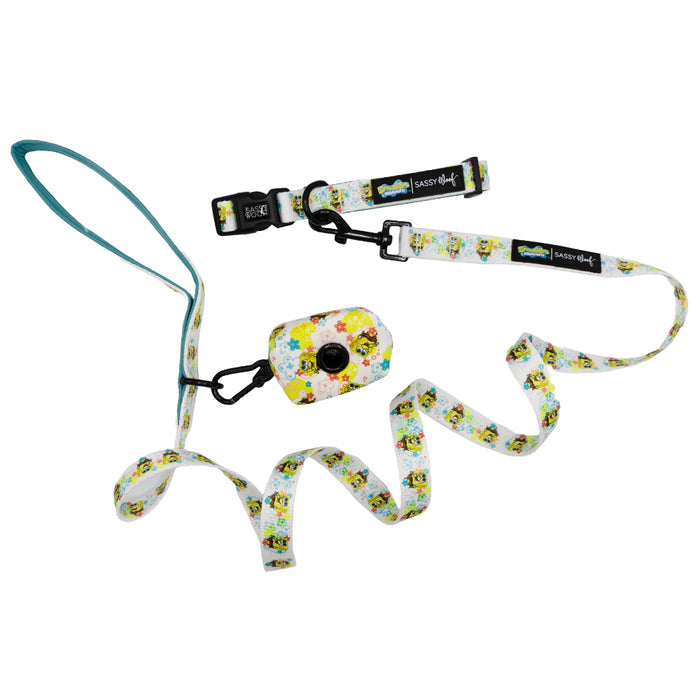 Bring some Bikini Bottom fun to every walk with the Sassy Woof Dog Collar Three Piece Bundle - SpongeBob SquarePants™! This set features a colorful collar, leash with a teal handle, and waste bag holder—all adorned with playful cartoon prints on a crisp white background. The convenient bag holder attaches via a sturdy black clip, making it the perfect accessory set for any fan of SpongeBob pet gear.
