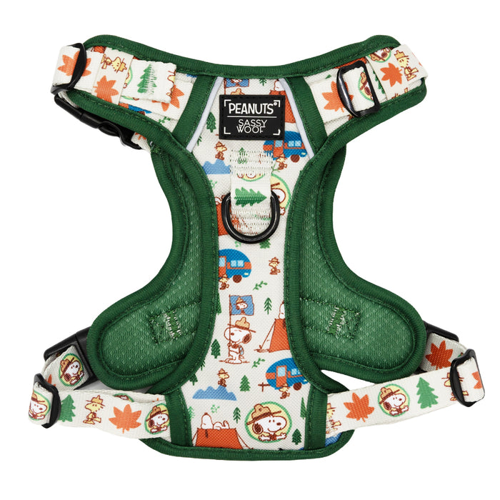 The Sassy Woof Dog Four Piece Bundle - Peanuts™ Beagle Scouts features a green harness with Snoopy, tents, trees, and campfires in vibrant colors—an ideal choice for fans seeking unique Snoopy pet accessories.