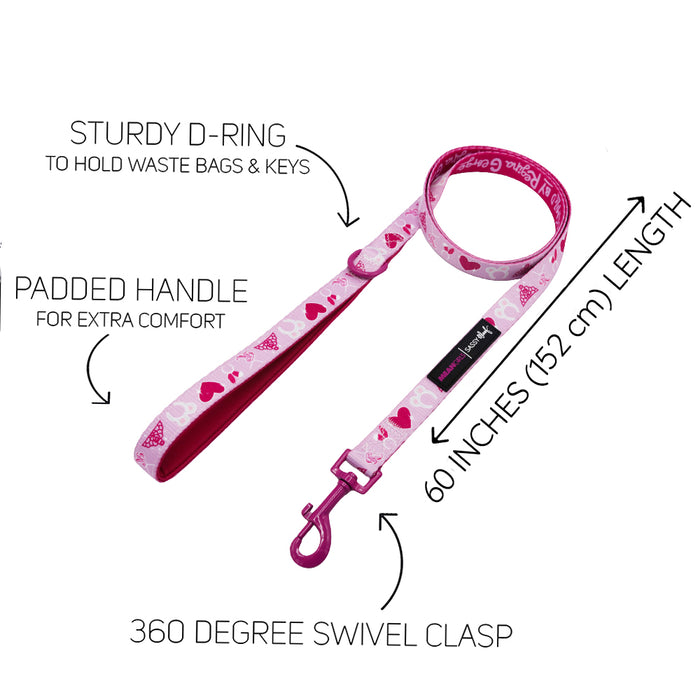 Part of our Mean Girls™ Collection, the Sassy Woof Dog Leash features pink and white hearts, a padded handle, sturdy D-ring for bags or keys, 60-inch length, and a 360° swivel clasp. Matching accessories available.
