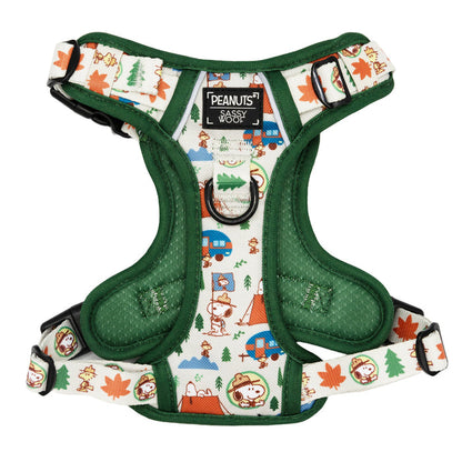 The Sassy Woof Dog Four Piece Bundle - Peanuts™ Beagle Scouts features a green harness with Snoopy, tents, trees, and campfires in vibrant colors—an ideal choice for fans seeking unique Snoopy pet accessories.