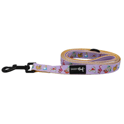 The Sassy Woof Dog Two Piece Bundle - Alice in Wonderland (Purple) features a vibrant leash with fun cartoon animal faces and a black metal clip—ideal to pair with an adjustable harness for extra style and comfort.