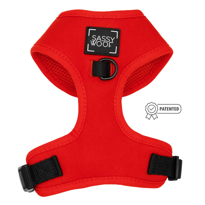 The Sassy Woof Dog Two Piece Bundle in Neon Red features black straps and adjustable harness options, perfect for fitting your puppy’s growth.