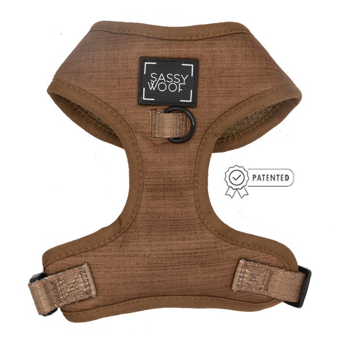 The Sassy Woof Dog Two Piece Bundle - Teddy features a brown adjustable harness with black hardware, D-ring for leashes, a Sassy Woof patch, patented badge, and adjustable straps for growing pups.