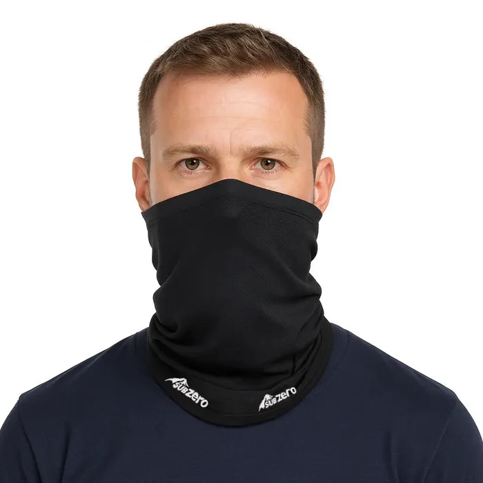 Head and shoulders shot of a man wearing a Sub Zero Factor 1 Plus neck warmer overhis nose and neck in black on a white background