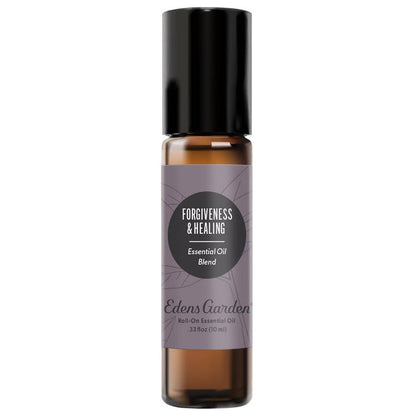 A black roll-on bottle labeled ' Forgiveness & Healing Essential Oil Blend' by Edens Garden.