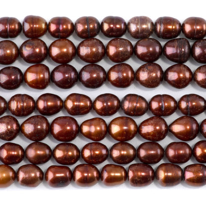 This is a Dakota Stones 7-9mm Freshwater Pearl Golden Brown Potato Gemstone strand of round beads in 15-16 inch strand.