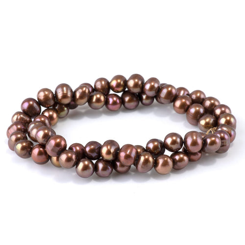 This is a Dakota Stones 7-9mm Freshwater Pearl Light Purple Brown Gemstone strand of round beads in 15-16 inch strand.