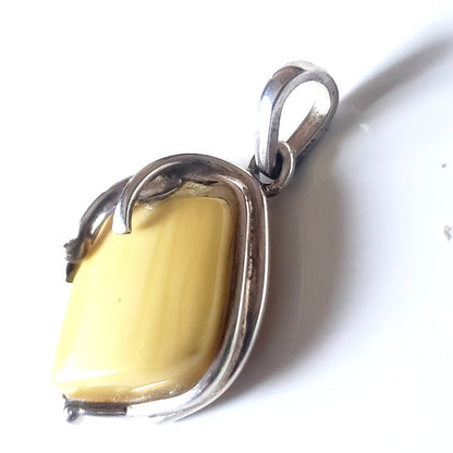 genuine light yellow  butterscotch amber pendant in sterling silver frame