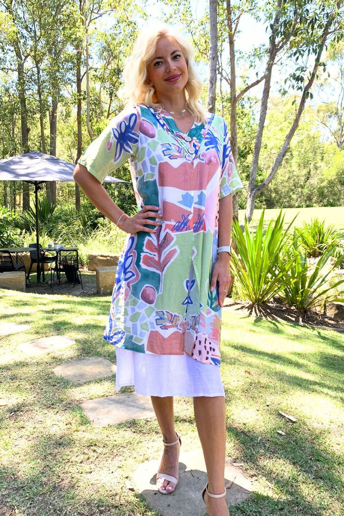 Green floral print summer tunic dress by La Mode, lightweight fabric with vibrant floral pattern, perfect for warm weather.