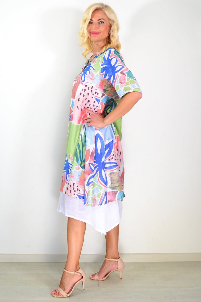 Green floral print summer tunic dress by La Mode, lightweight fabric, v-neck, sleeveless design, perfect for warm weather.