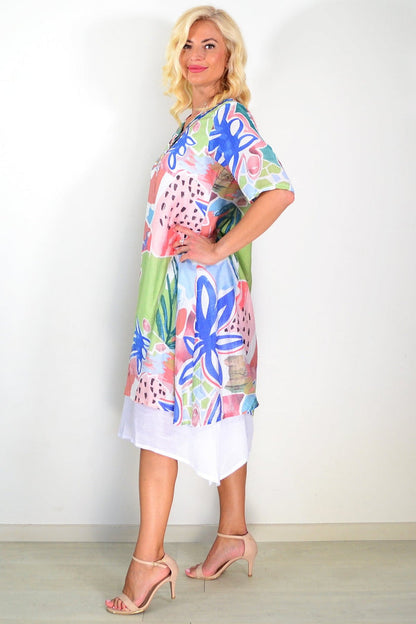 Green floral print summer tunic dress by La Mode, lightweight fabric, v-neck, sleeveless design, perfect for warm weather.