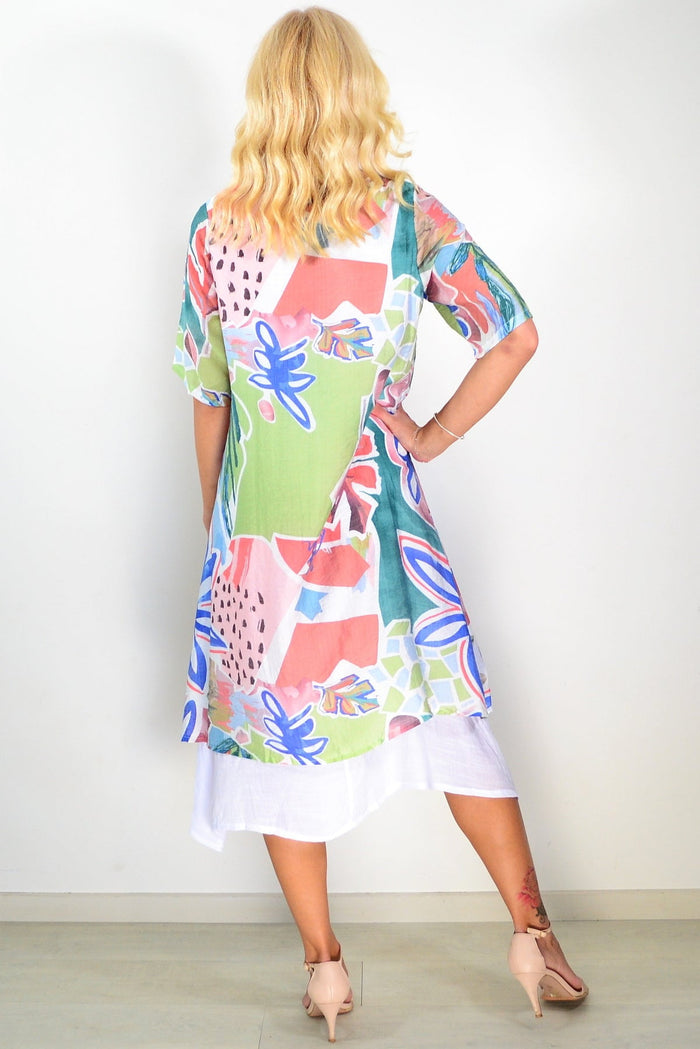 Green floral print summer tunic dress by La Mode, showcasing lightweight fabric and vibrant floral design.