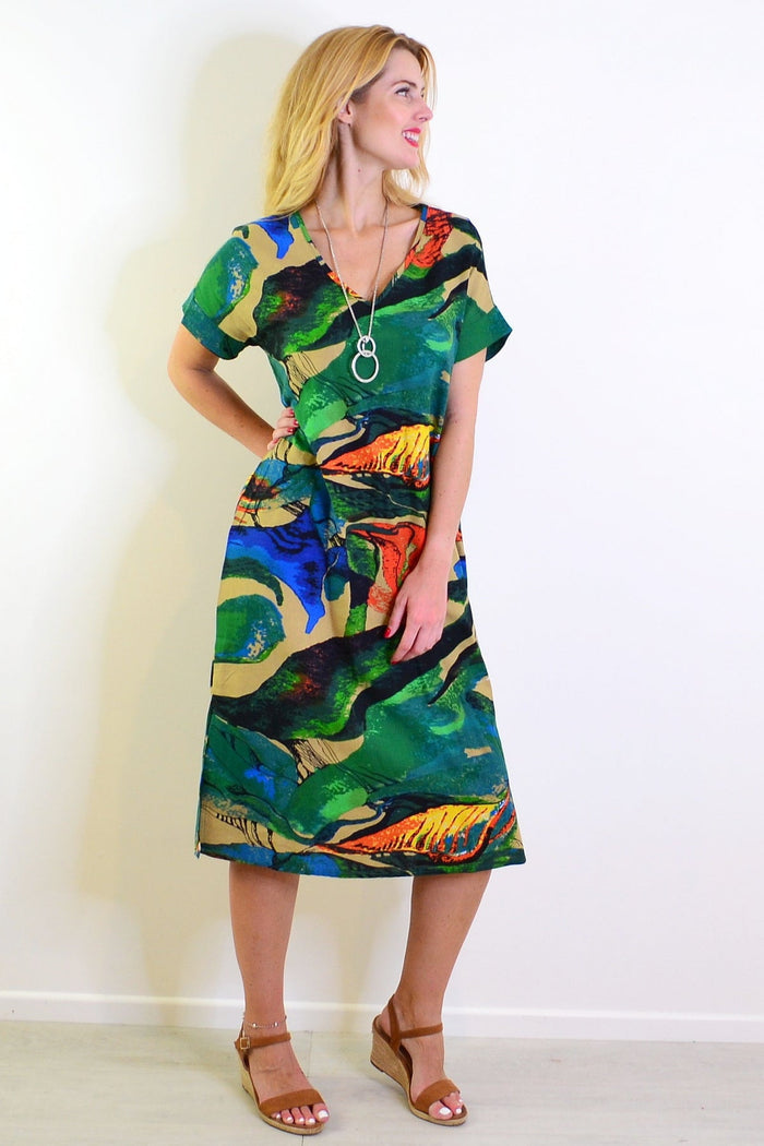 Green and orange playful tunic dress from Hourglass with a relaxed fit and vibrant color blocking, perfect for casual wear.