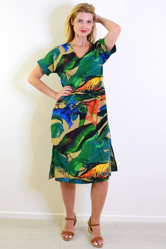 Green and orange playful tunic dress by Hourglass, featuring a vibrant, relaxed fit with a stylish, casual design.