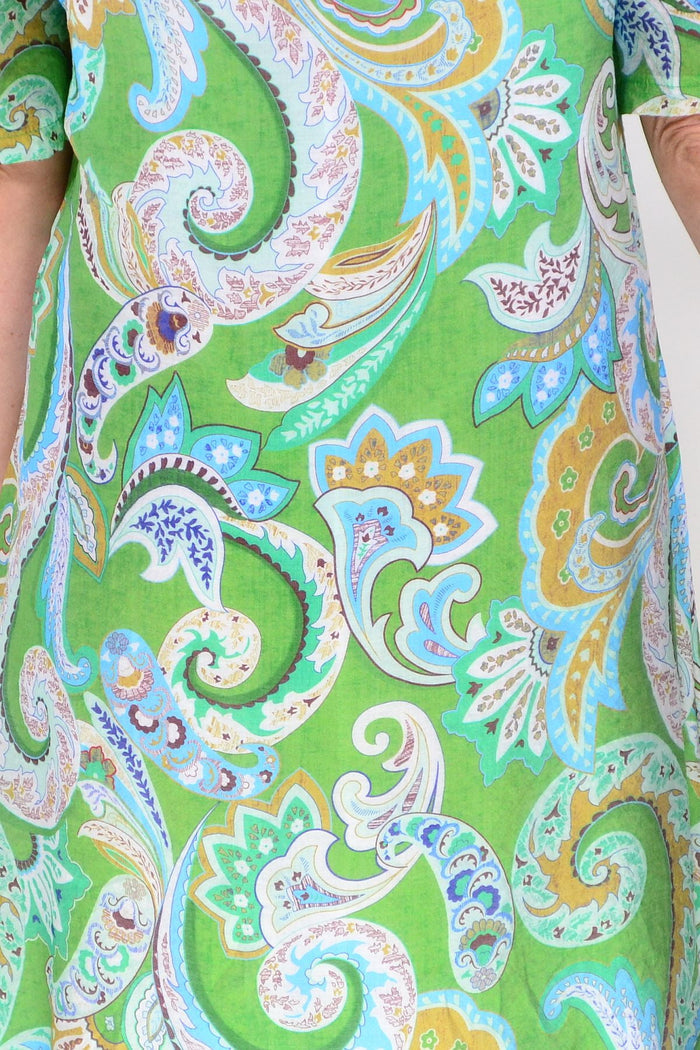 Green paisley summer tunic dress from La Mode, lightweight fabric with flowy design and vibrant paisley pattern.