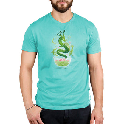 Premium Cotton T-shirt_TeeTurtle Green Tea Dragon Caribbean Blue apparel featuring an artistic green dragon with leaf details coming out of a cup of green tea with lotus flowers inside.