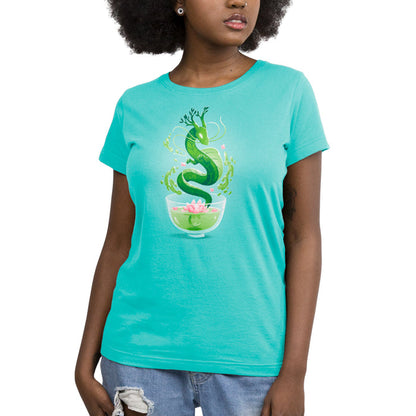 Premium Cotton T-shirt_TeeTurtle Green Tea Dragon Caribbean Blue apparel featuring an artistic green dragon with leaf details coming out of a cup of green tea with lotus flowers inside.