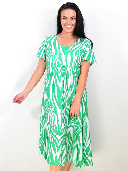 Green and white striped tunic dress by Hourglass, shown hanging with a relaxed fit and casual style.