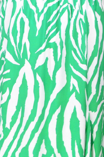 Hourglass green and white striped tunic dress with long sleeves and a relaxed fit, displayed on a hanger.