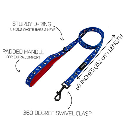 The Sassy Woof Dog Leash - MLB™ x Peanuts™ Los Angeles Dodgers™ features a blue design with Snoopy, white and yellow dog bones, padded red handle, sturdy D-ring for bags/keys, 360° swivel clasp, and is 60 inches (152 cm) long.